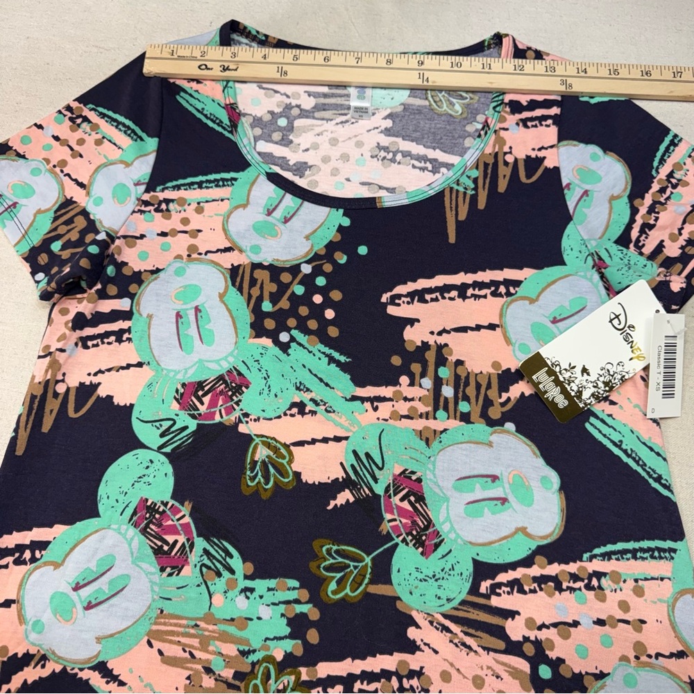 🤠 3/$20 Disney LuLaRoe Classic Top Pink & Green Design - Size XS - NWT - Picture 10 of 14
